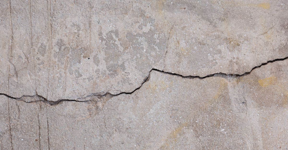 A close-up crack in a concrete slab