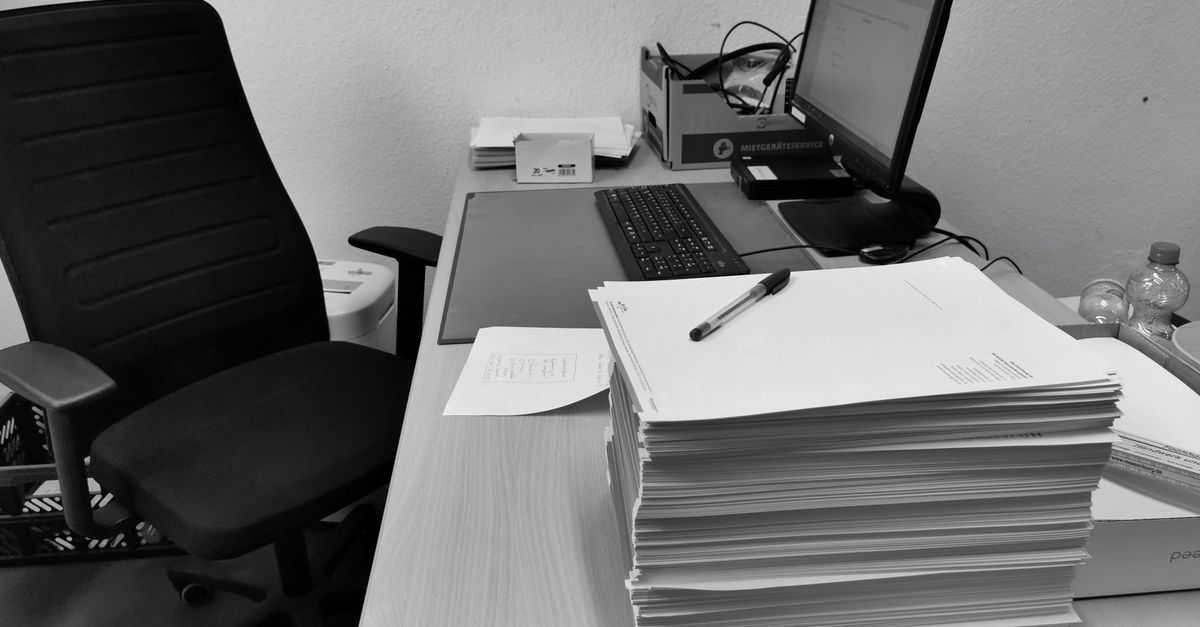 Signed documents and a pen