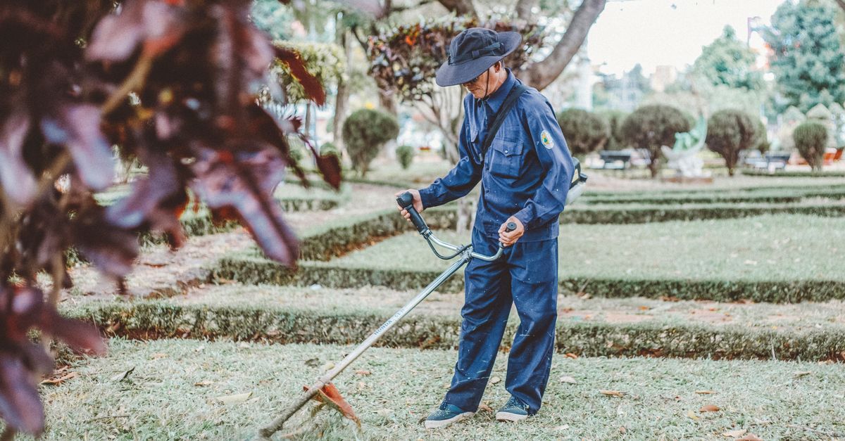 A landscaper tending a property