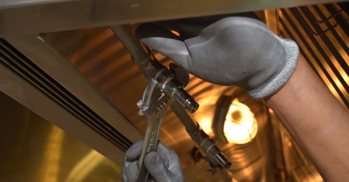 Plumbing tools and a pipe wrench