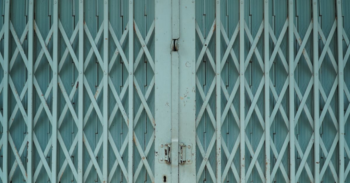Garage door panels and track hardware