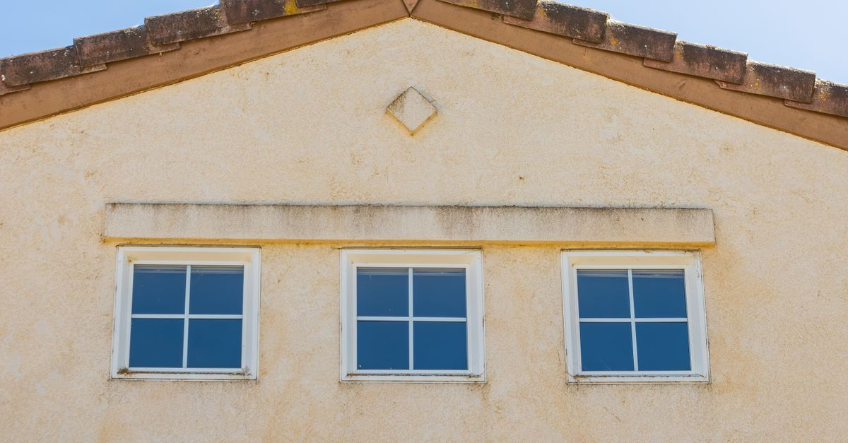 Close-up of sun-faded exterior paint