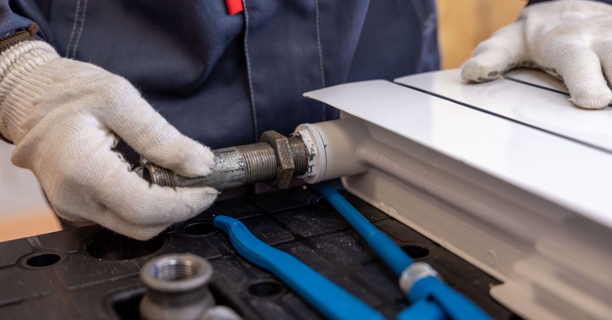 Plumbing tools and a pipe wrench