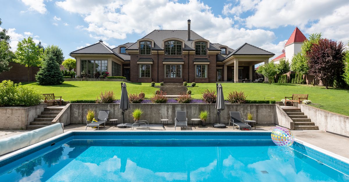A backyard pool and deck