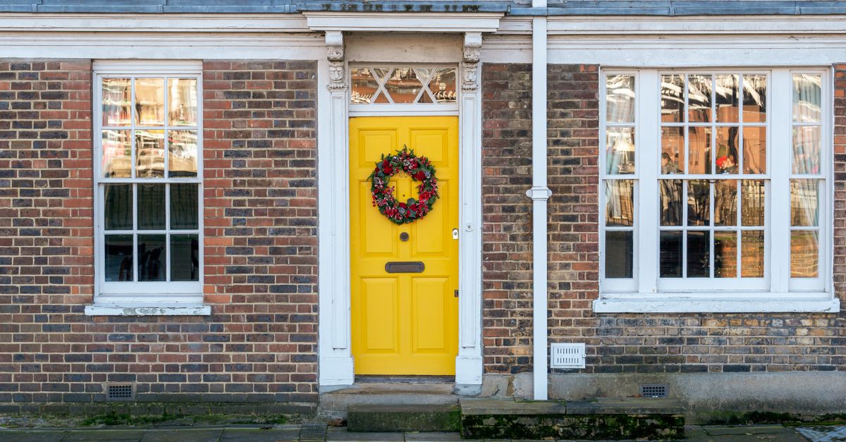 A contract being reviewed at a doorstep