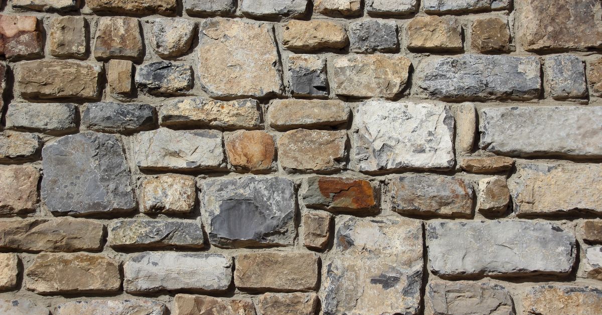 A concrete block retaining wall