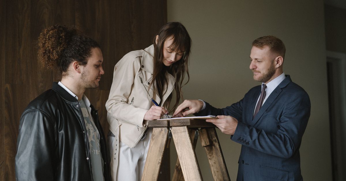 An electrician with a notepad