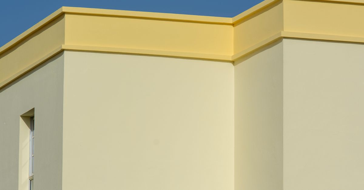 Close-up of sun-faded exterior paint