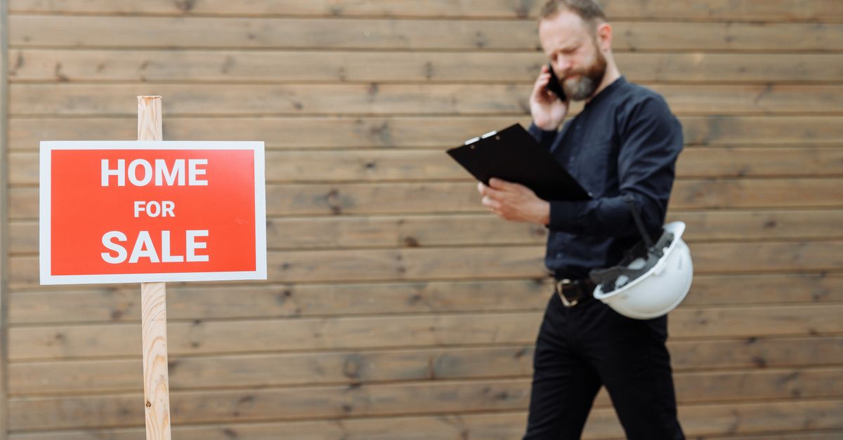 A service contract being reviewed at a doorstep