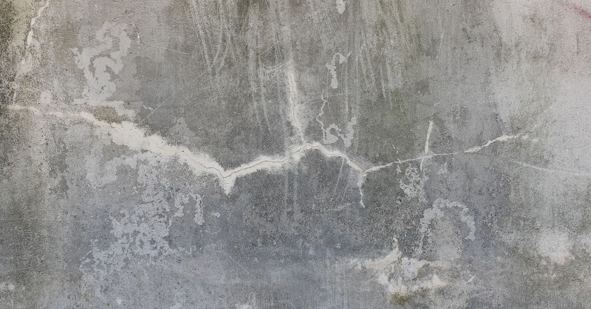 A crack running through a concrete surface
