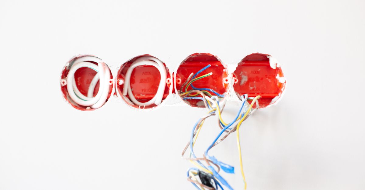 An electrician working on home wiring