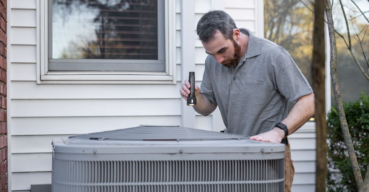 An HVAC repair invoice being reviewed