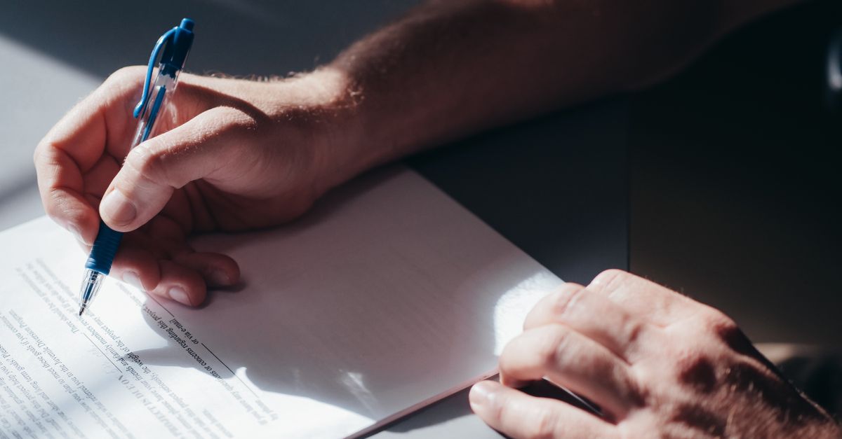 A homeowner and contractor with a contract