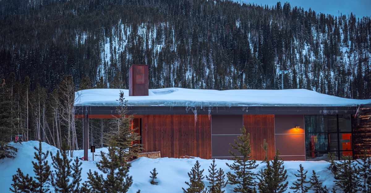 A wood-sided mountain home exterior