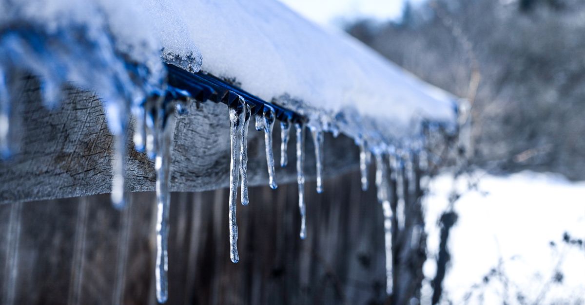 A frozen pipe coated in ice
