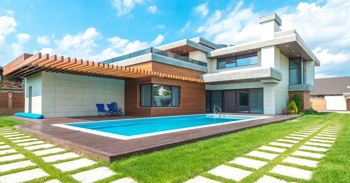 A backyard swimming pool under construction