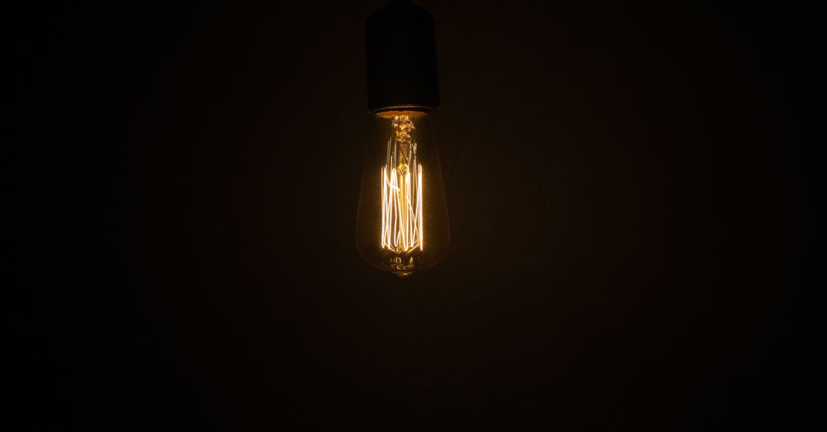A light fixture being examined