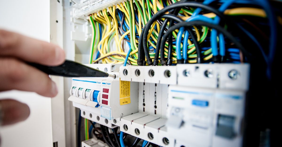 An electrician working on home wiring