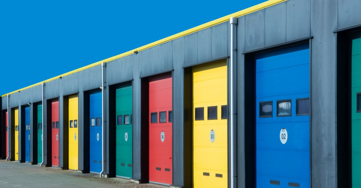 A garage door with a broken torsion spring