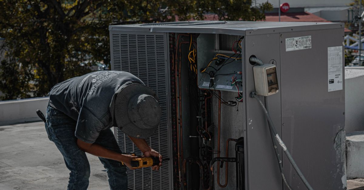A rooftop HVAC unit being installed