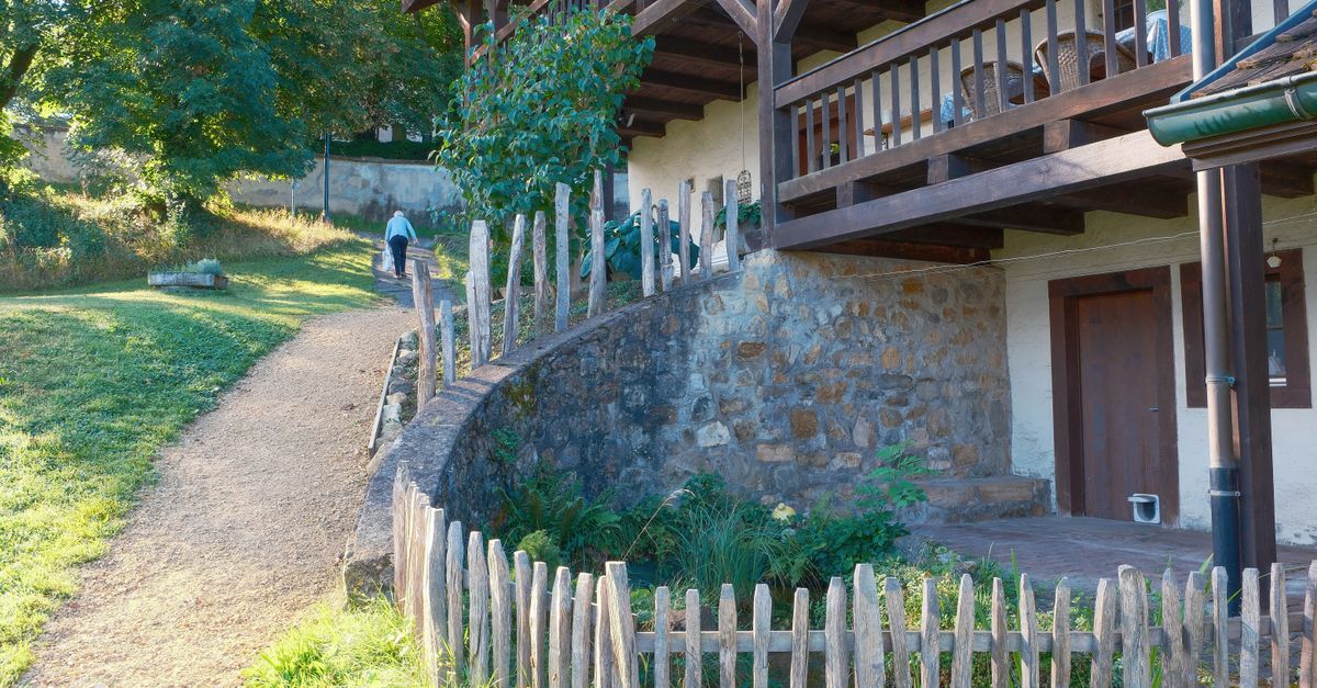 A block wall under construction in a yard