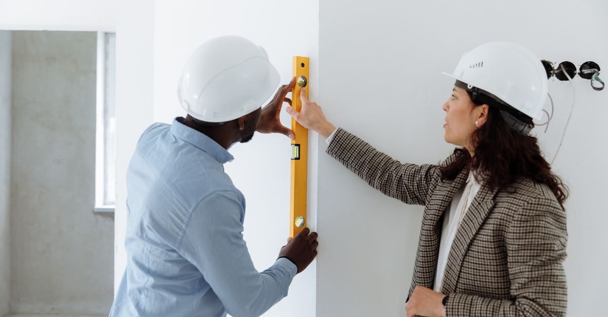 A contractor going over an estimate with a homeowner